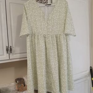 Green and white floral button down dress